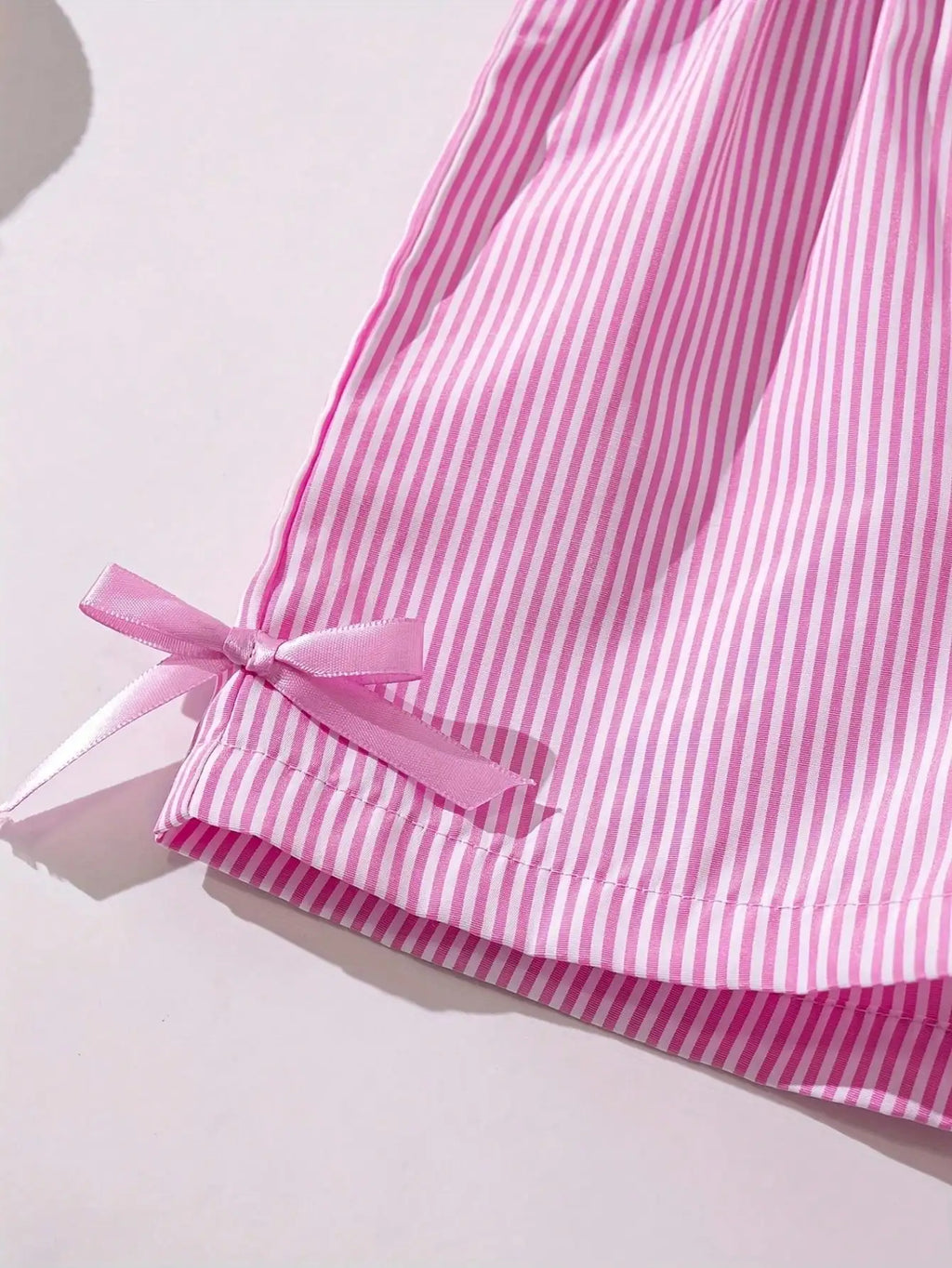 Fashion girl pink and white striped round neck lace up bow ruffle edge+pink striped side butterfly shorts two-piece set