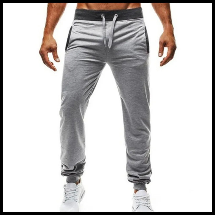 Loose Fit Men's Casual Pants Spring New Style Youth Elastic Pure Color Cuffed Long Trousers Breathable Machine Washable