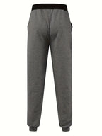 Loose Fit Men's Casual Pants Spring New Style Youth Elastic Pure Color Cuffed Long Trousers Breathable Machine Washable