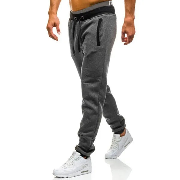 Loose Fit Men's Casual Pants Spring New Style Youth Elastic Pure Color Cuffed Long Trousers Breathable Machine Washable