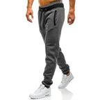 Loose Fit Men's Casual Pants Spring New Style Youth Elastic Pure Color Cuffed Long Trousers Breathable Machine Washable