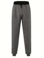 Loose Fit Men's Casual Pants Spring New Style Youth Elastic Pure Color Cuffed Long Trousers Breathable Machine Washable