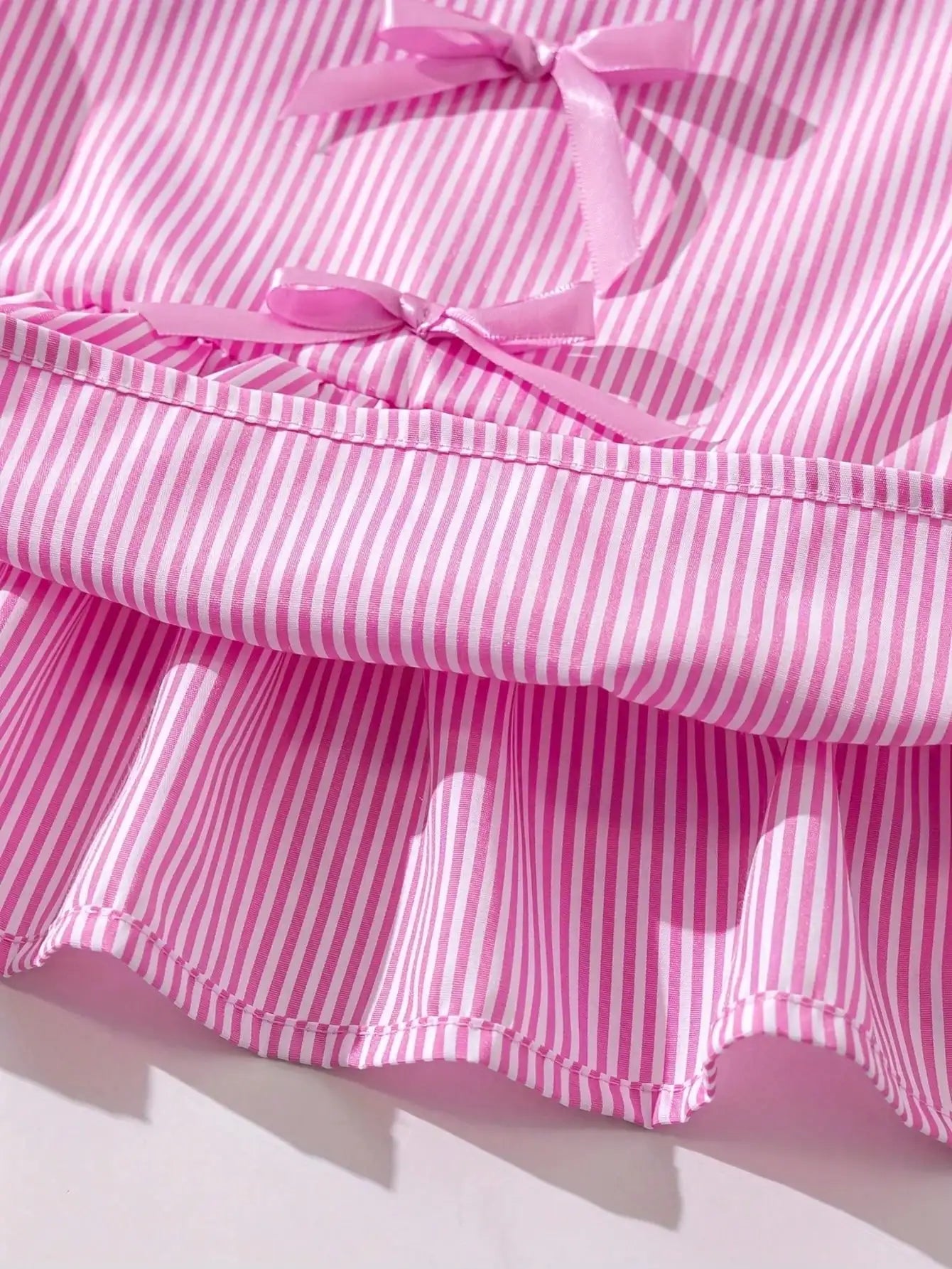 Fashion girl pink and white striped round neck lace up bow ruffle edge+pink striped side butterfly shorts two-piece set
