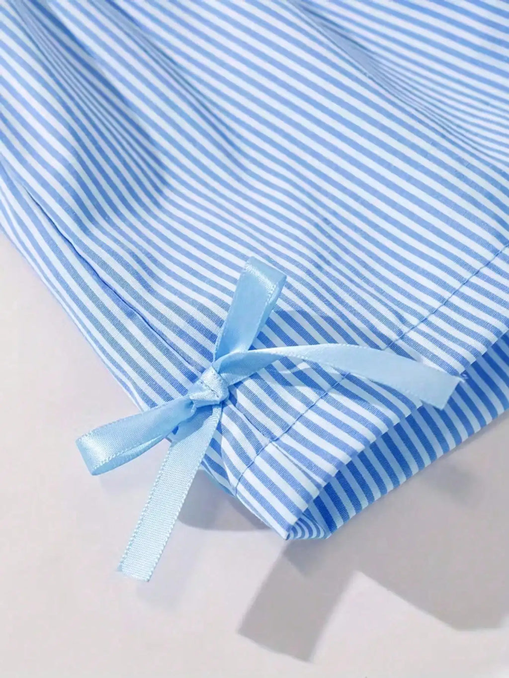 Fashion girl pink and white striped round neck lace up bow ruffle edge+pink striped side butterfly shorts two-piece set
